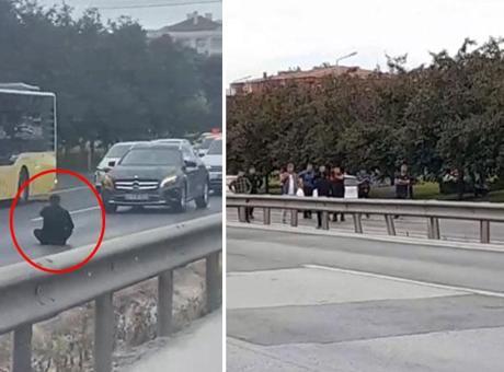 İstanbul D-100 karayolunda hareketli dakikalar! Bıçakla yola oturan şahıs trafiği felç etti